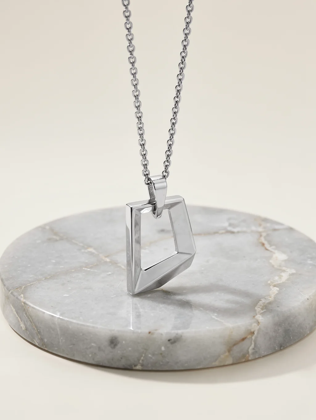 Contemporary architectural titanium and mixed media jewellery